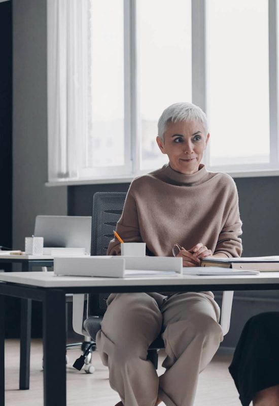 woman-having-interview-with-confident-hr-manager-while-sitting-at-the-office-desk-together.jpg